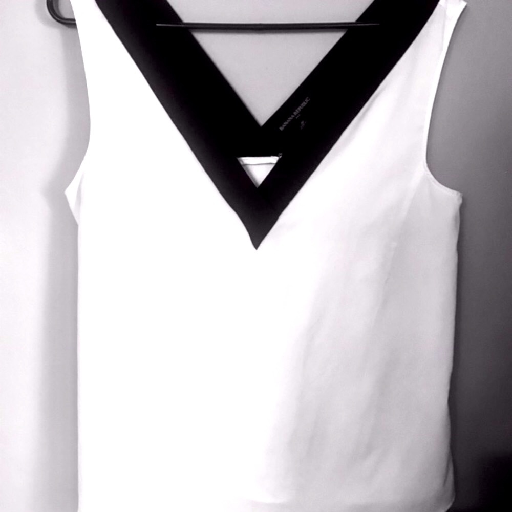 Banana Republic blouse with black trim.sleeveless